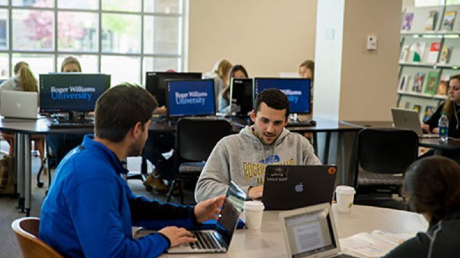 Students studying in library.