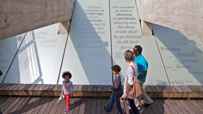 People explore a memorial