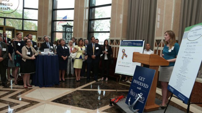 Woman speaks at a reception