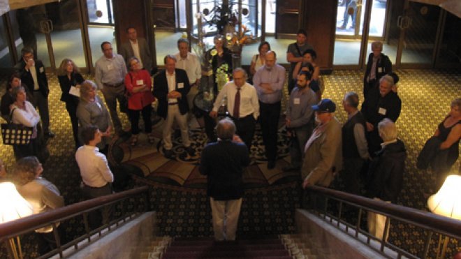 People tour a historic home