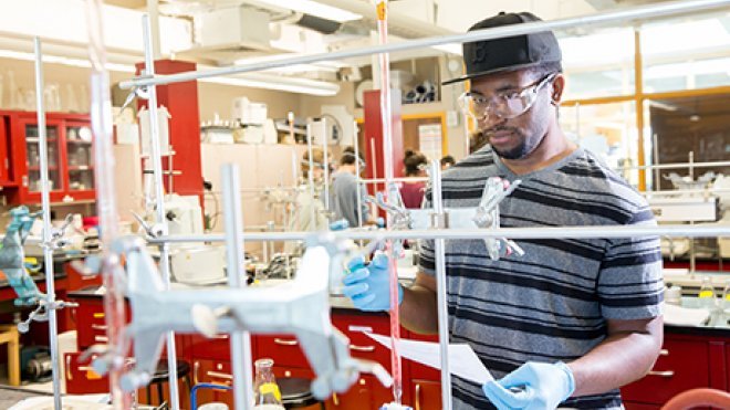 Student working in chemistry lab.