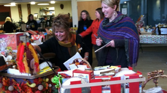 Visitors look at turkey baskets