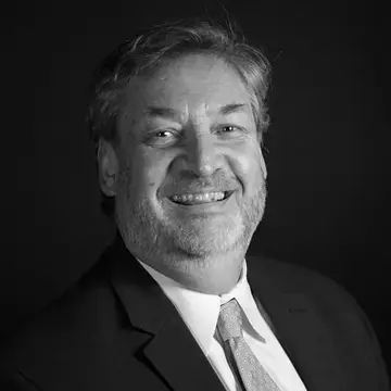 A photo of Greg Laramie in black and white