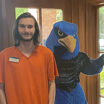Jordan McGarty stands with Swoop