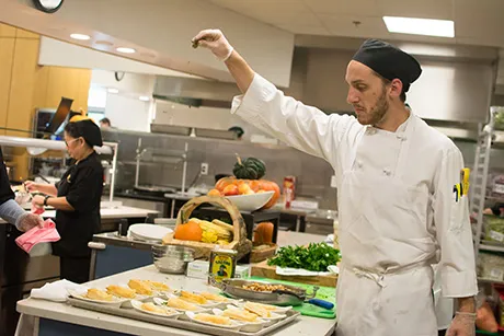 chef adding parsley