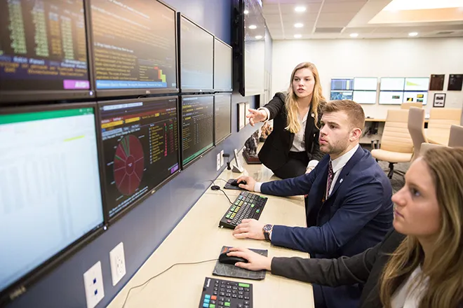 Finance students working in the CAFE