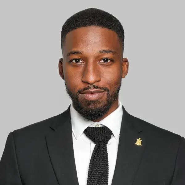 Headshot of Student Elliot Hardy in a Dark Suit