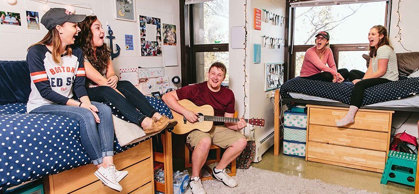 Students in a room having fun