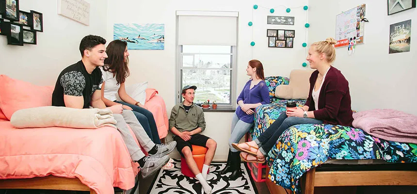 A group of students in a North Campus room.