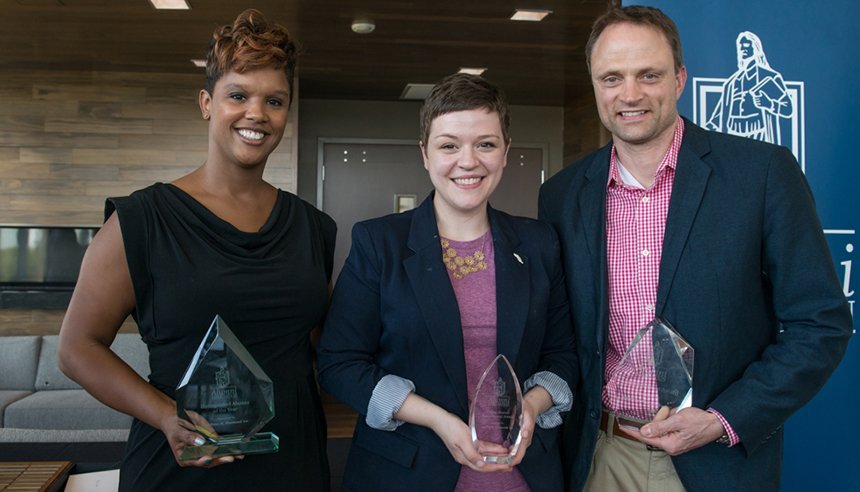 image of three RWU alums accepting awards