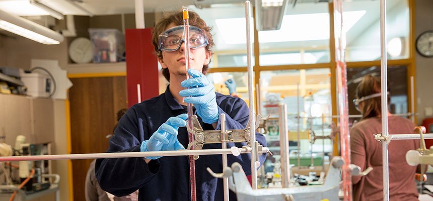 Student works in chemistry lab.