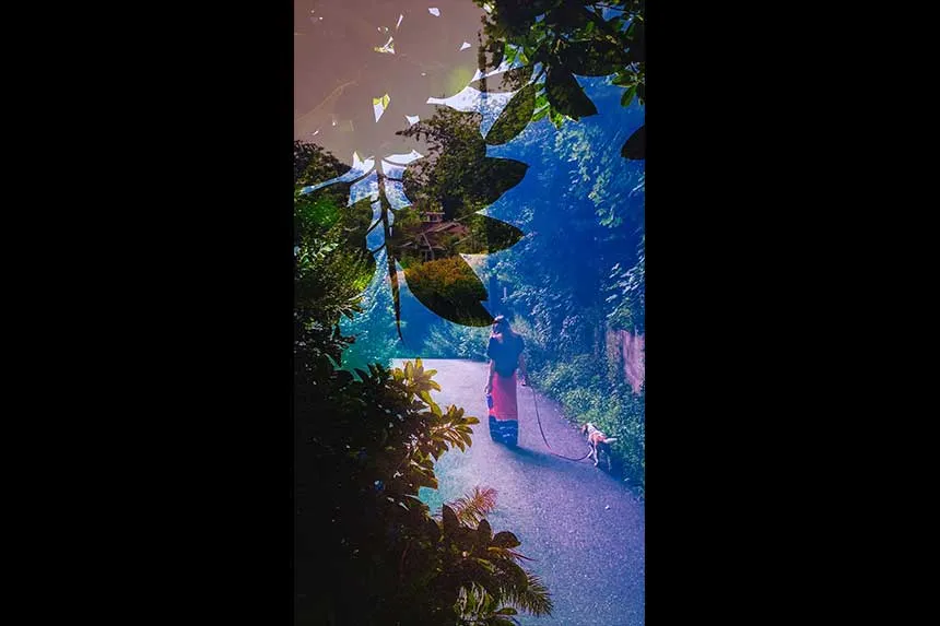 A photo of a woman on a path.