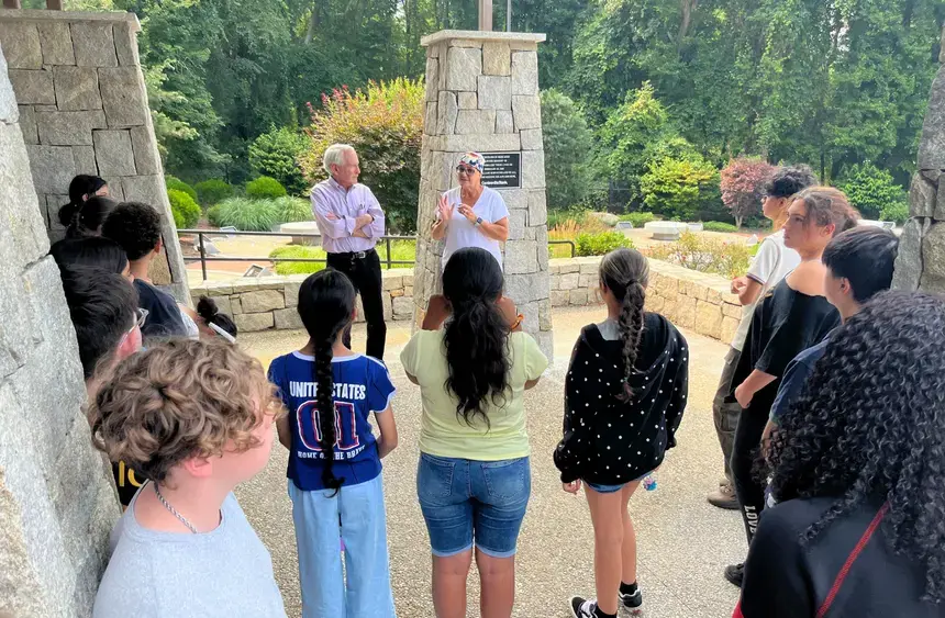 Mark Mandell speaks to campers at the Station nightclub fire memorial.
