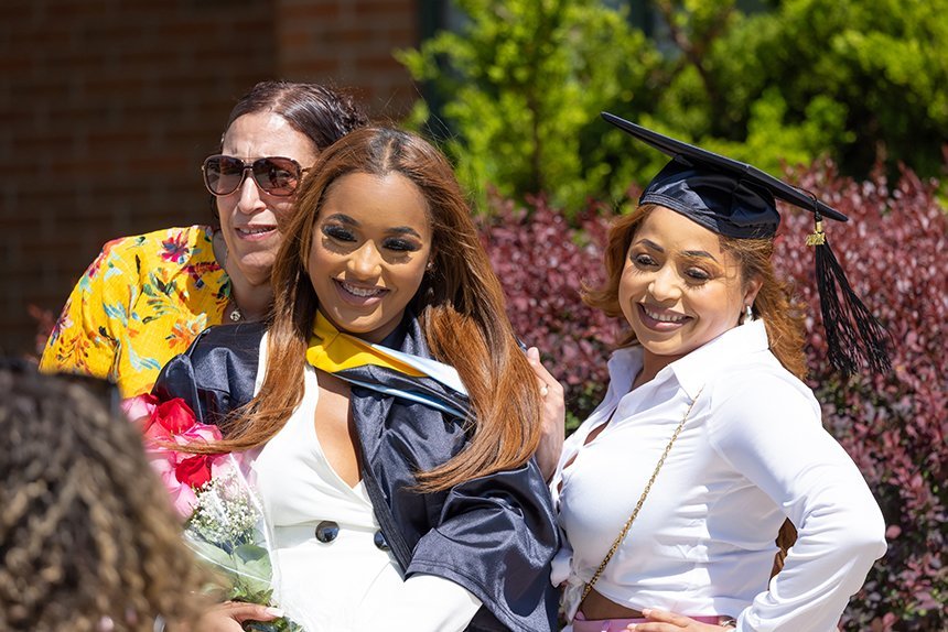 Graduates pose for photos