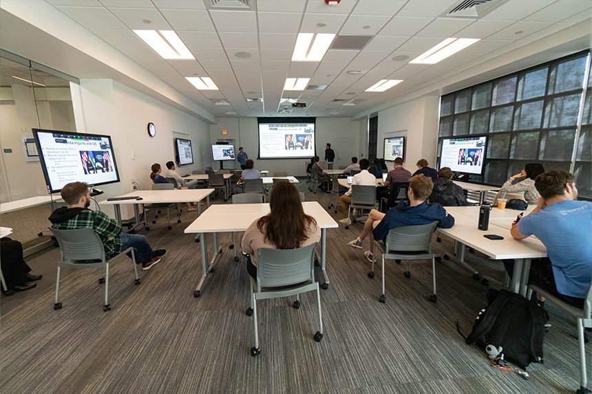 A classroom of students listening to a SASH presentation 