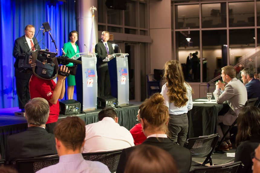 Student addresses candidates. 