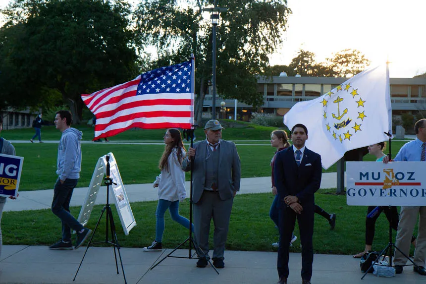 People stand with flags.