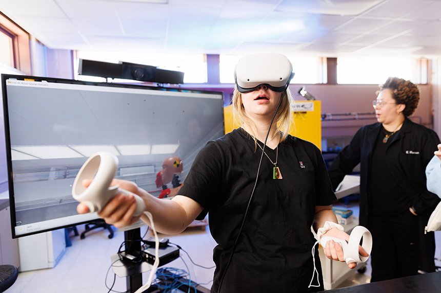 A student wearing a VR headset. 