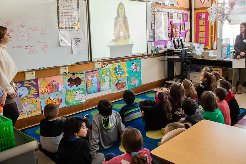 elementary students watch video on engineering