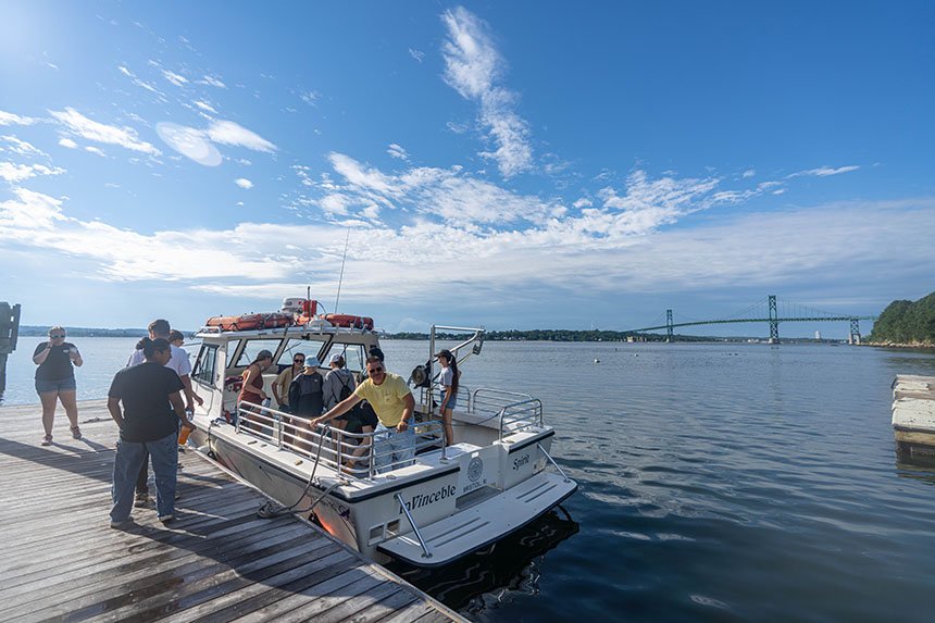 Students boarding the InVinceble Spirit research vessel. 