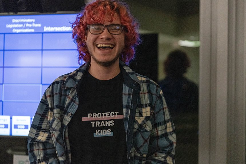 Parker Schwartz, vice president of the Sexuality & Gender Alliance, at a Jeopardy-style event held in Global Heritage Hall.