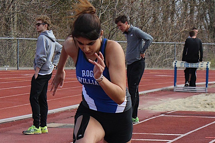 woman student running on track