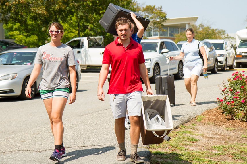 Student walking with parents