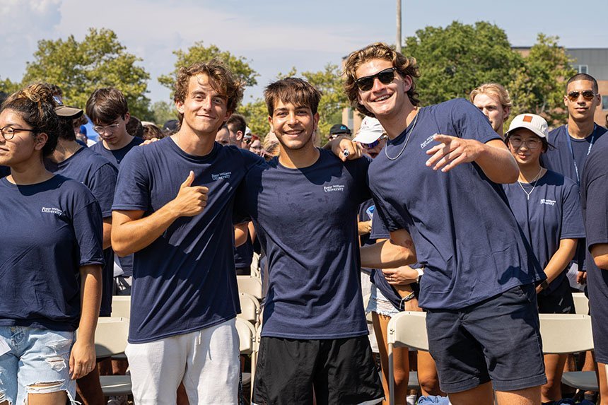 Students pose for a photo before Convocation begins. 