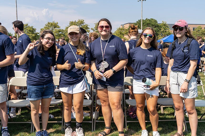 A group of students poses for a photo before Convocation. 