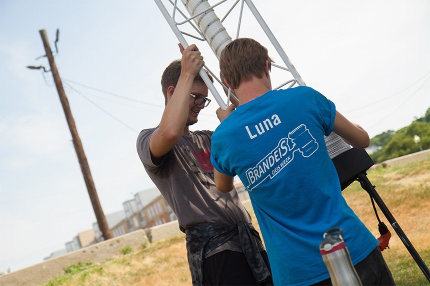 Keegan Heston working with a volunteer