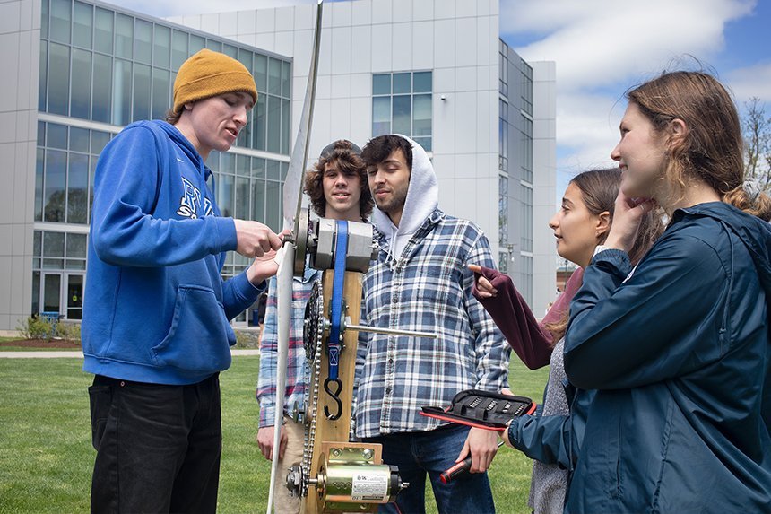 Engineering students with their wind turbine 