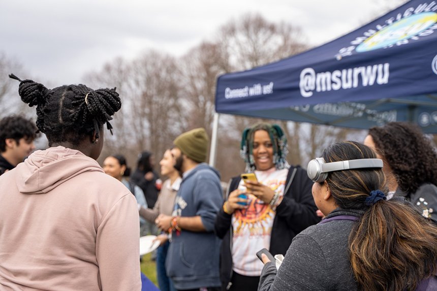 Students gather outside GHH as part of MSU's Field Day event. 