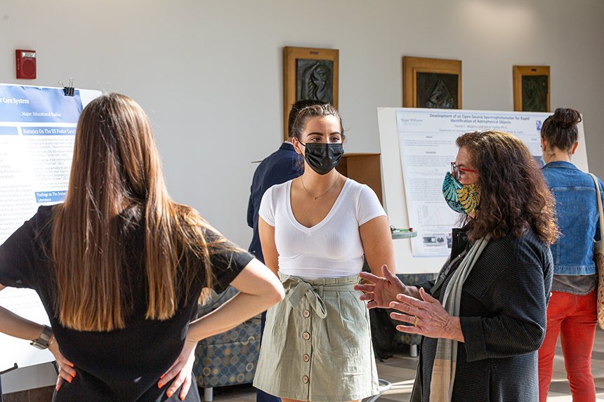 Students interact with professor