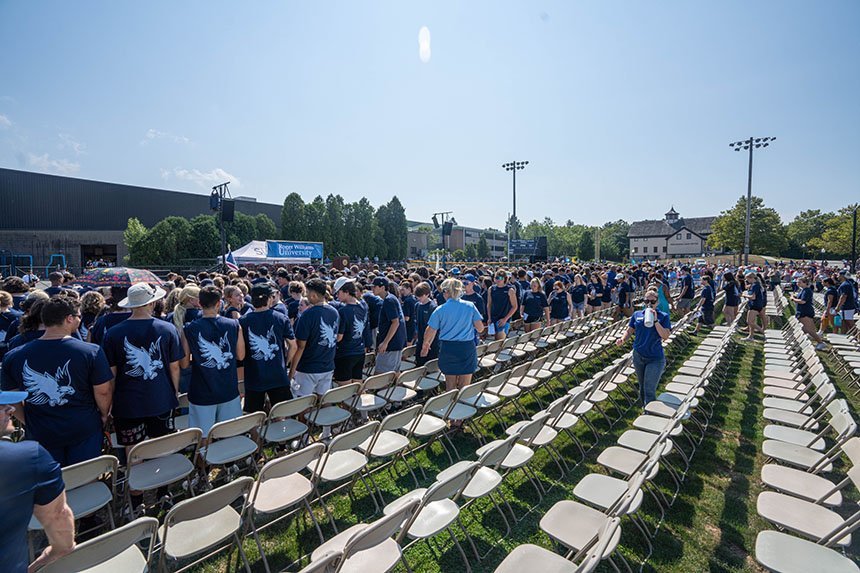 Students file into their seats for the Convocation ceremony. 