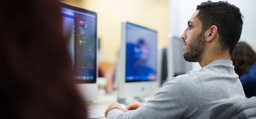 Student in class working on a computer