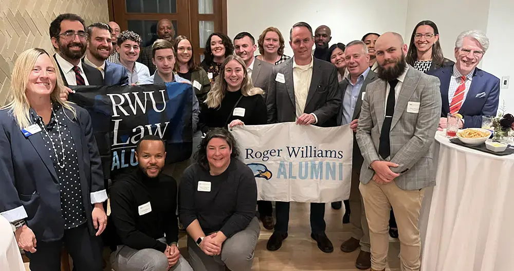 Group of RWU alumni at an event
