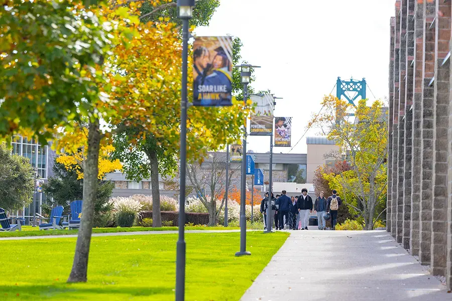 Students walk across Bristol Campus in the fall
