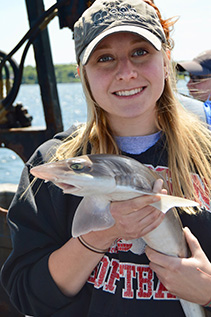 student with fish