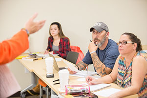 Students interacting in class